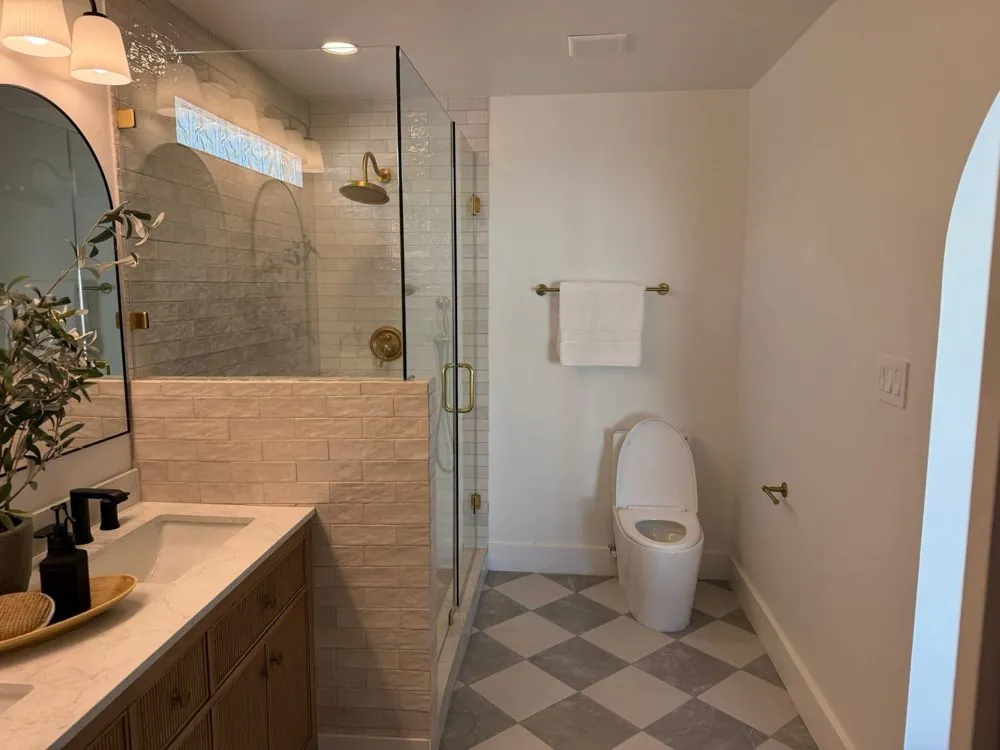 Bathroom remodel with tile shower and vanity